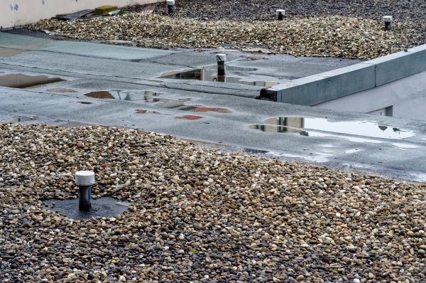 Tar And Gravel Roof Renovation
